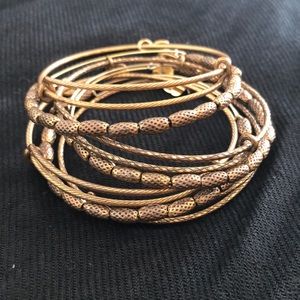 Alex and Ani 7 piece stacked gold bangle set